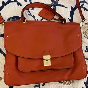 Used but in a great condition Tory Burch Orange bag